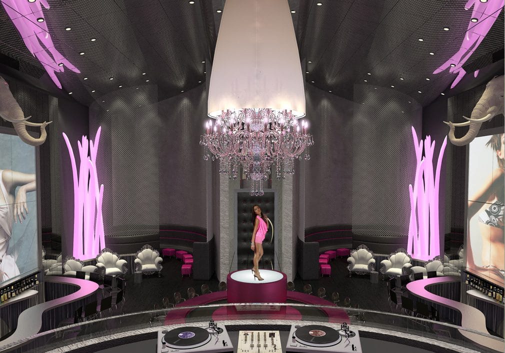 Luxury nightclub interior design with crystal chandelier, elevated DJ booth, pink LED lighting, sculptural seating, and dramatic stage centerpiece by Jordan Guide Design